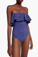 Traje de baño y pareo elegante a rayas